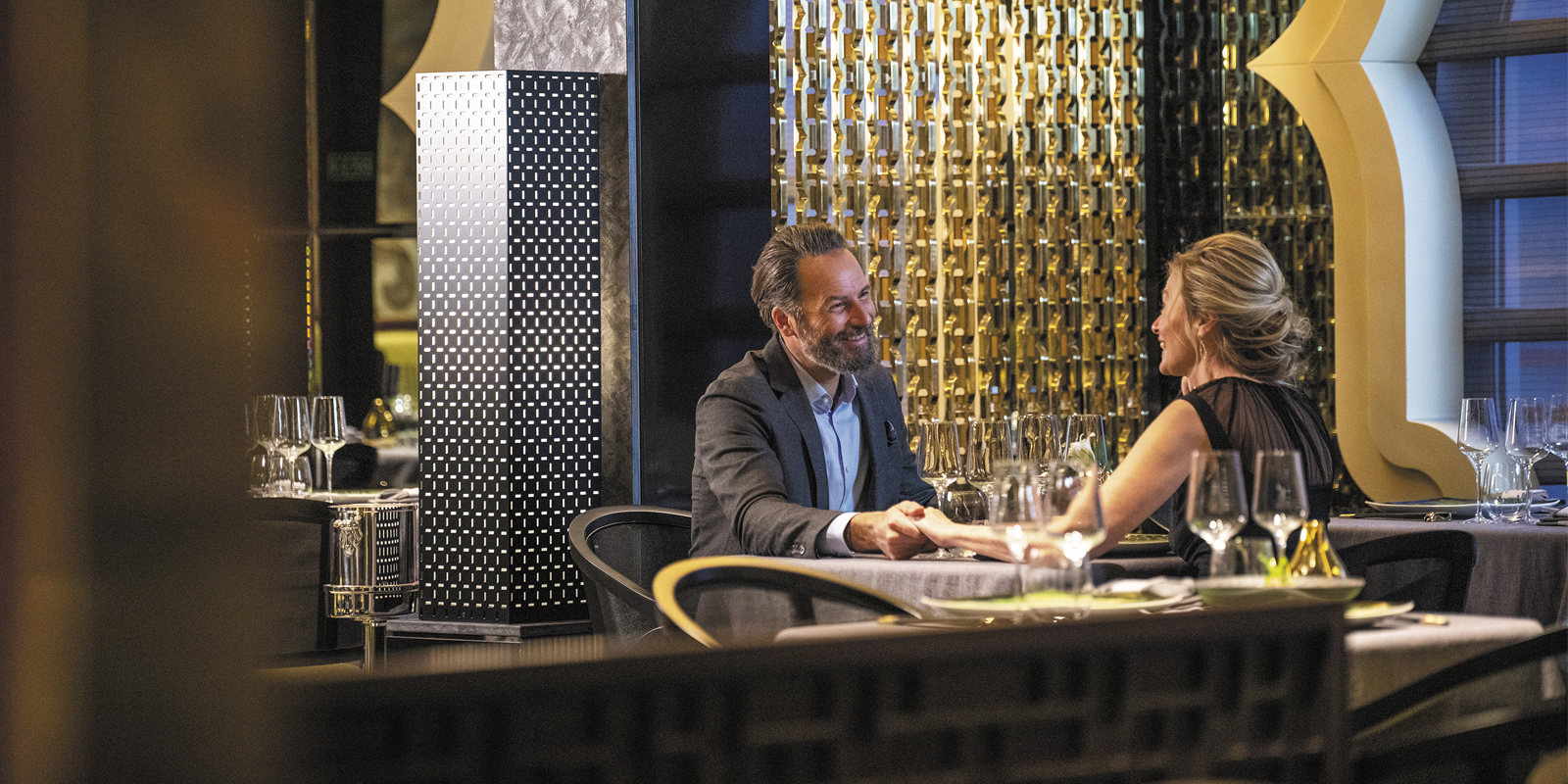 Couple having drinks in Chartreuse French Bistro