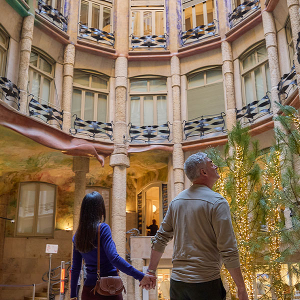 couple holding hands in Barcelona