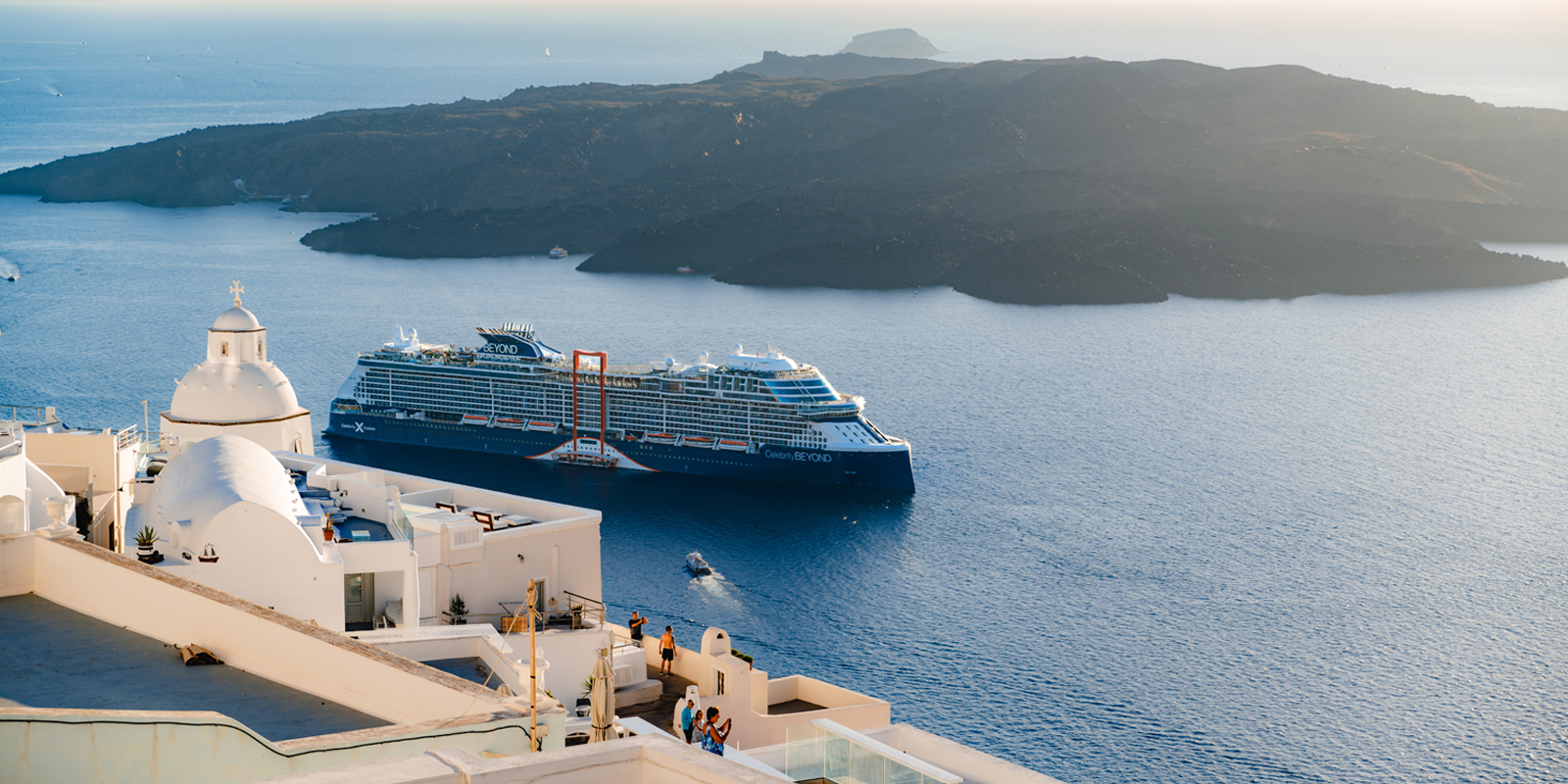 Aerial view of a Celebrity cruise ship in Santorini, Greece